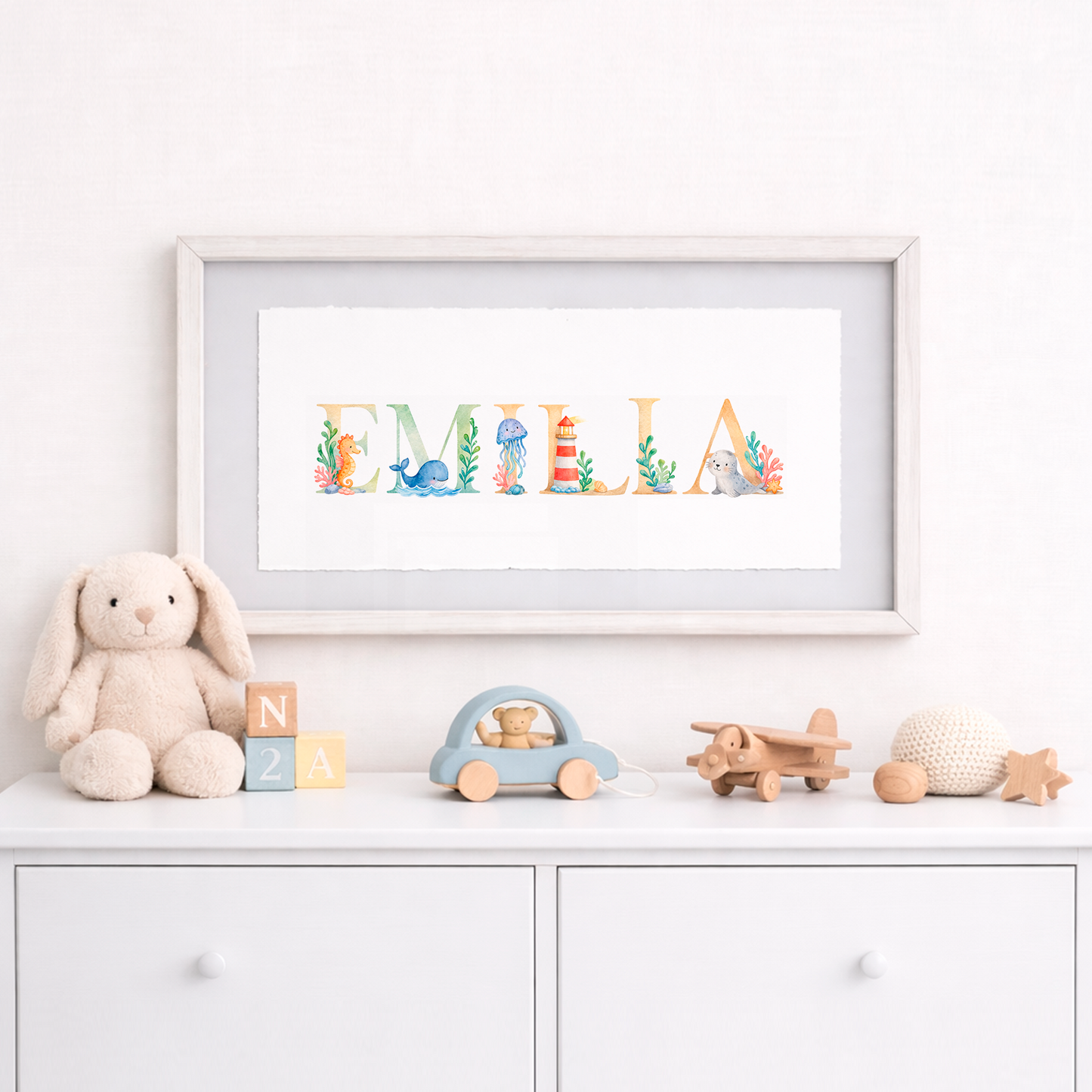 Cuadro con nombres decorados con motivos marinos