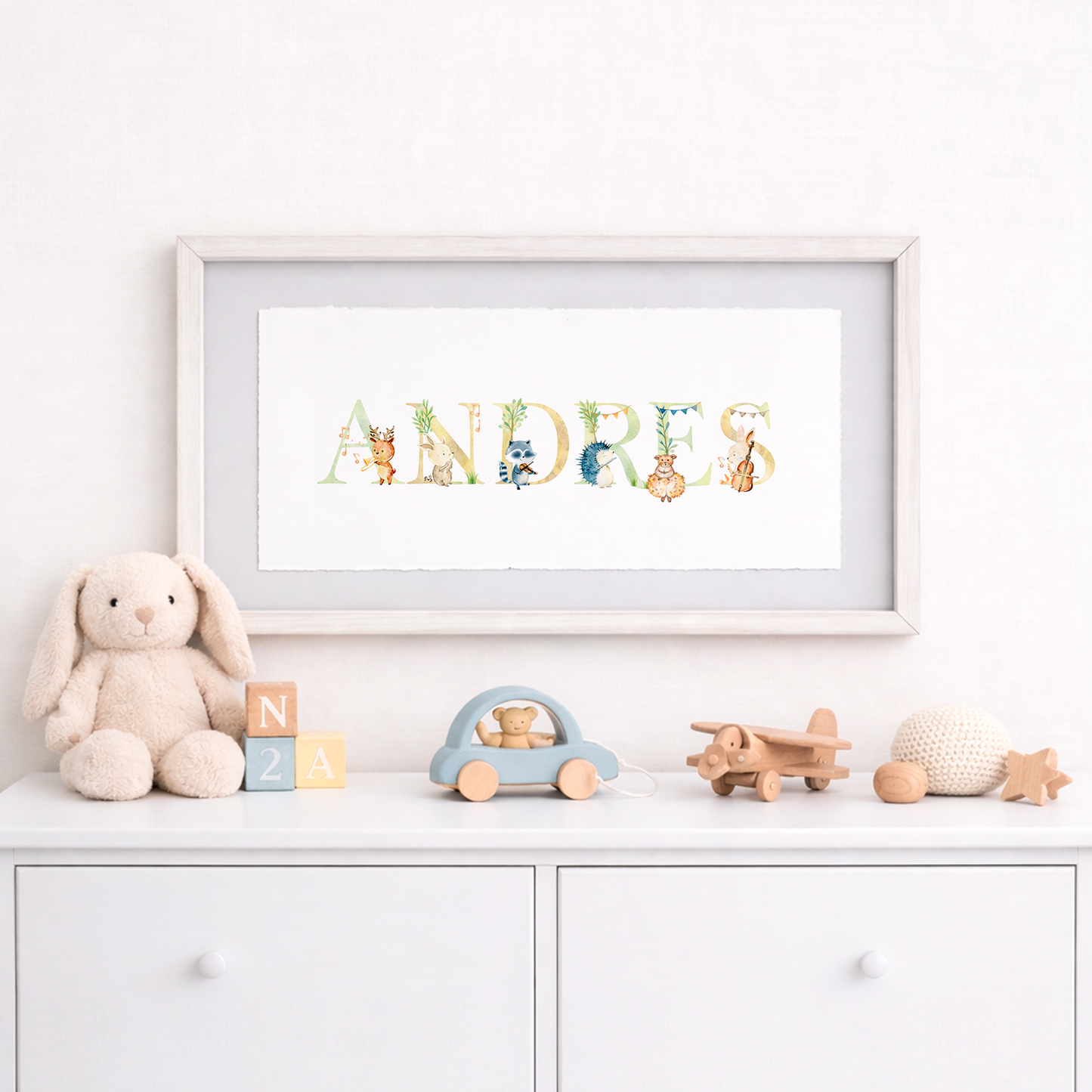 Cuadro con nombres decorados con motivos musicales
